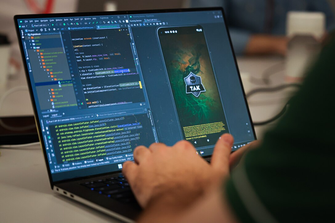 U.S. Marine Corps Capt. David Whalen, assigned to the Marine Innovation Unit (MIU), Marine Forces Reserve, works on developing a “Flight Mode” software feature at the Marine Corps Software Factory (MCSWF) in Austin, Texas, 17 - 29 March, 2025. MIU Marines are assisting MCSWF in the development and production of software solutions that address critical needs for the Marine Corps, including Flight Mode, an interface that makes it easier for pilots to receive and record digital information in flight. MIU is a Selected Marine Corps Reserve unit headquartered in Newburgh, N.Y. that accelerates the development and adoption of advanced capabilities across the Marine Corps. (U.S.Marine Corps photo by Cpl. Orion Stpierre)