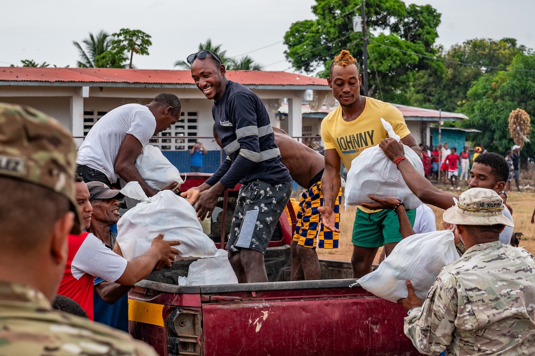 Locals of La Esmeralda off the coast of Panama load food into a truck during PANAMAX-Alpha Phase 0 in Panama, March 28, 2025.
