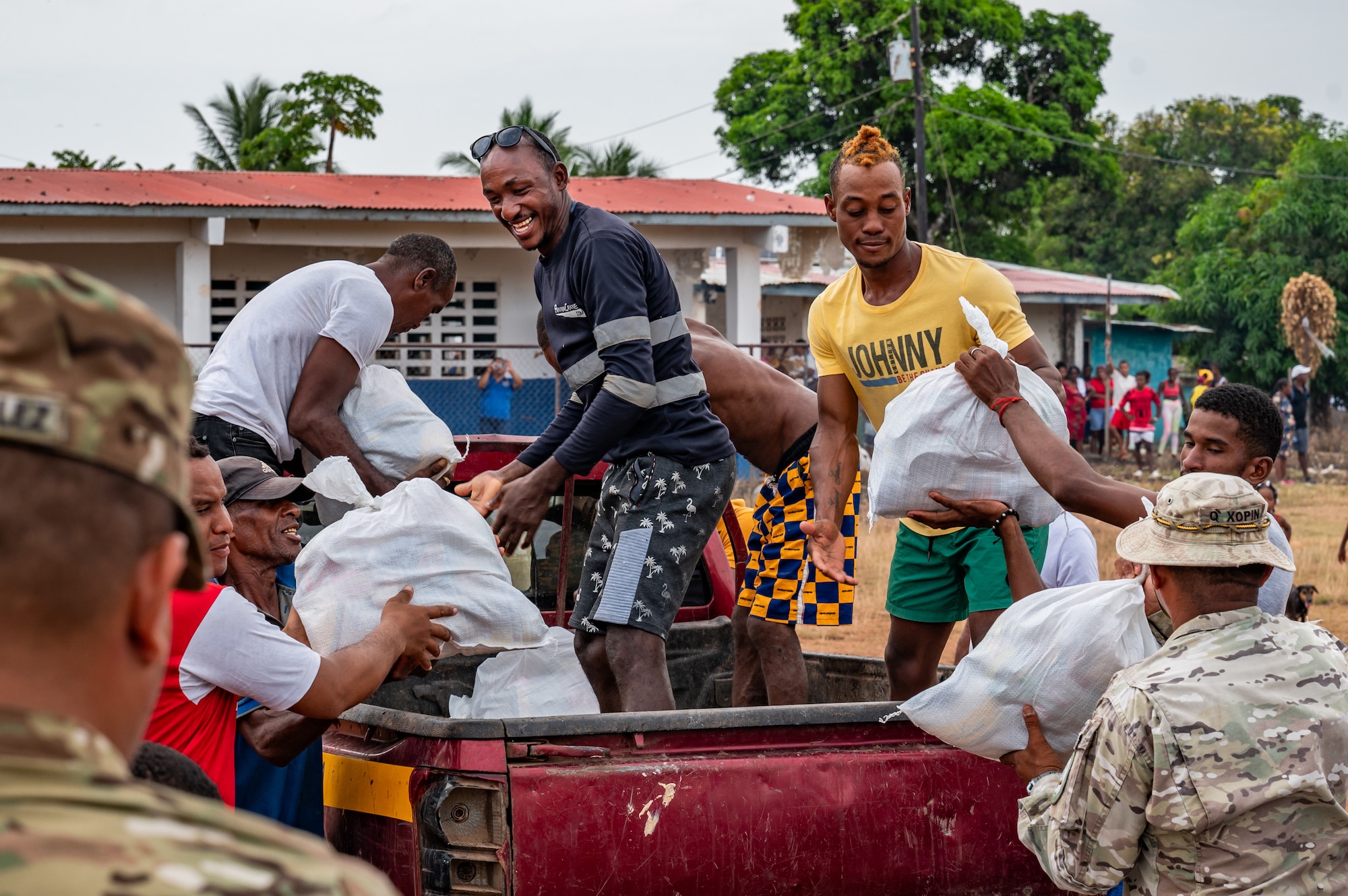Locals of La Esmeralda off the coast of Panama load food into a truck during PANAMAX-Alpha Phase 0 in Panama, March 28, 2025.
