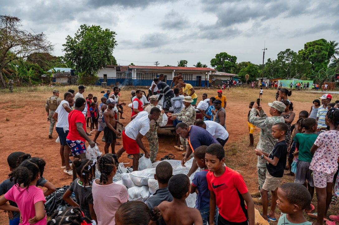 Locals of La Esmeralda off the coast of Panama load food into a truck during PANAMAX-Alpha Phase 0 in Panama, March 28, 2025.