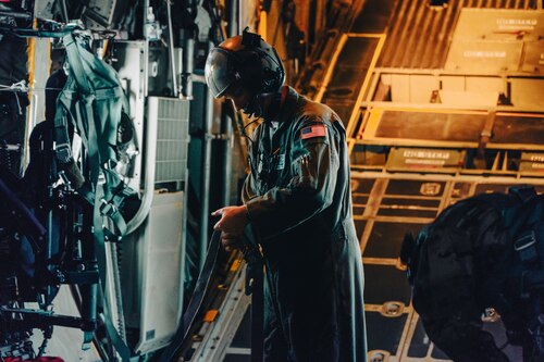An Airman assigned to the 189th Airlift Wing witnesses an eclipse during a training flight over central Arkansas, April 8, 2024. As a critical component of Total Force Integration, the Arkansas Air National Guard’s 189th AW also provides a world class instruction environment.