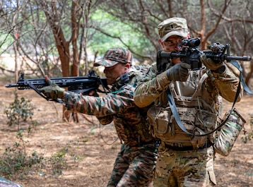 ANDHRA PRADESH, India (April 3, 2025) — A Soldier assigned to Bayonet Company, 1st Battalion, 5th Infantry Regiment, 1st Infantry Brigade Combat Team, 11th Airborne Division, provides cover for an Indian Army Soldier, under the command of Col. Yash...