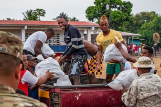 Locals of La Esmeralda off the coast of Panama load food into a truck during PANAMAX-Alpha Phase 0 in Panama, March 28, 2025.