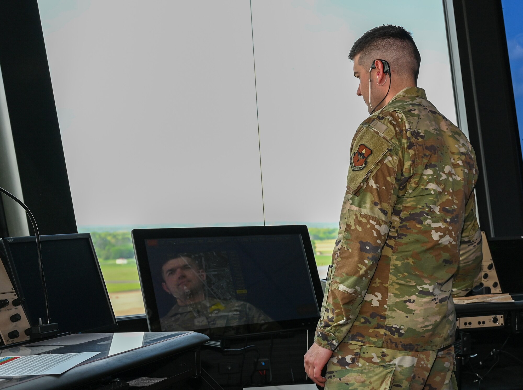 U.S. Air Force Senior Airman Logan Jarrett, 42nd Operations Support Squadron air traffic controller, looks at a monitor at Maxwell Air Force Base, Alabama, April 1, 2025.