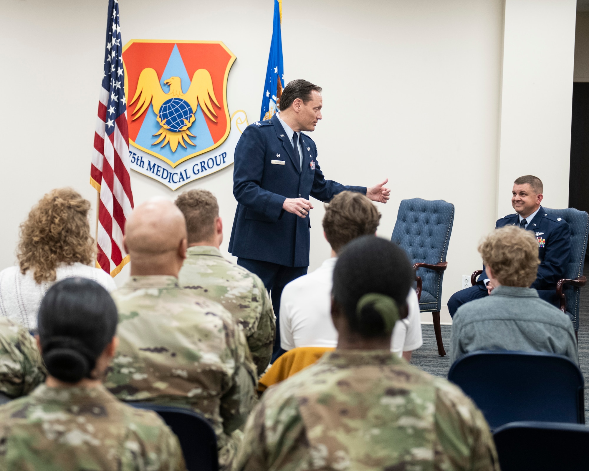 Col. Robert Garner, 932nd Medical Group commander, spoke about Lt. Col. Chad Carter, 932nd Aerospace Medicine Squadron, incoming commander, during an assumption of command ceremony at Scott Air Force Base, Illinois, April 5, 2025.  Carter previously served in the 932nd AMDS as the chief of flight medicine. (U.S. Air Force photo by Staff Sgt. Brooke Spenner)