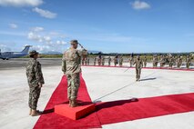 Air Force Gen. Steve Nordhaus, chief, National Guard Bureau, joins Maj. Gen. Calisto dos Santos Coliati, Timor-Leste’s vice chief of defense and Air Force Brig. Gen. Thomas Hannon, assistant adjutant general, Rhode Island Air National Guard, in a ribbon-cutting ceremony to mark the handover of a humanitarian aid and disaster relief warehouse, and an aircraft hangar, Baucau, Timor-Leste, April 4, 2025.