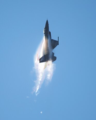Fighter jet climbs straight up into the sky