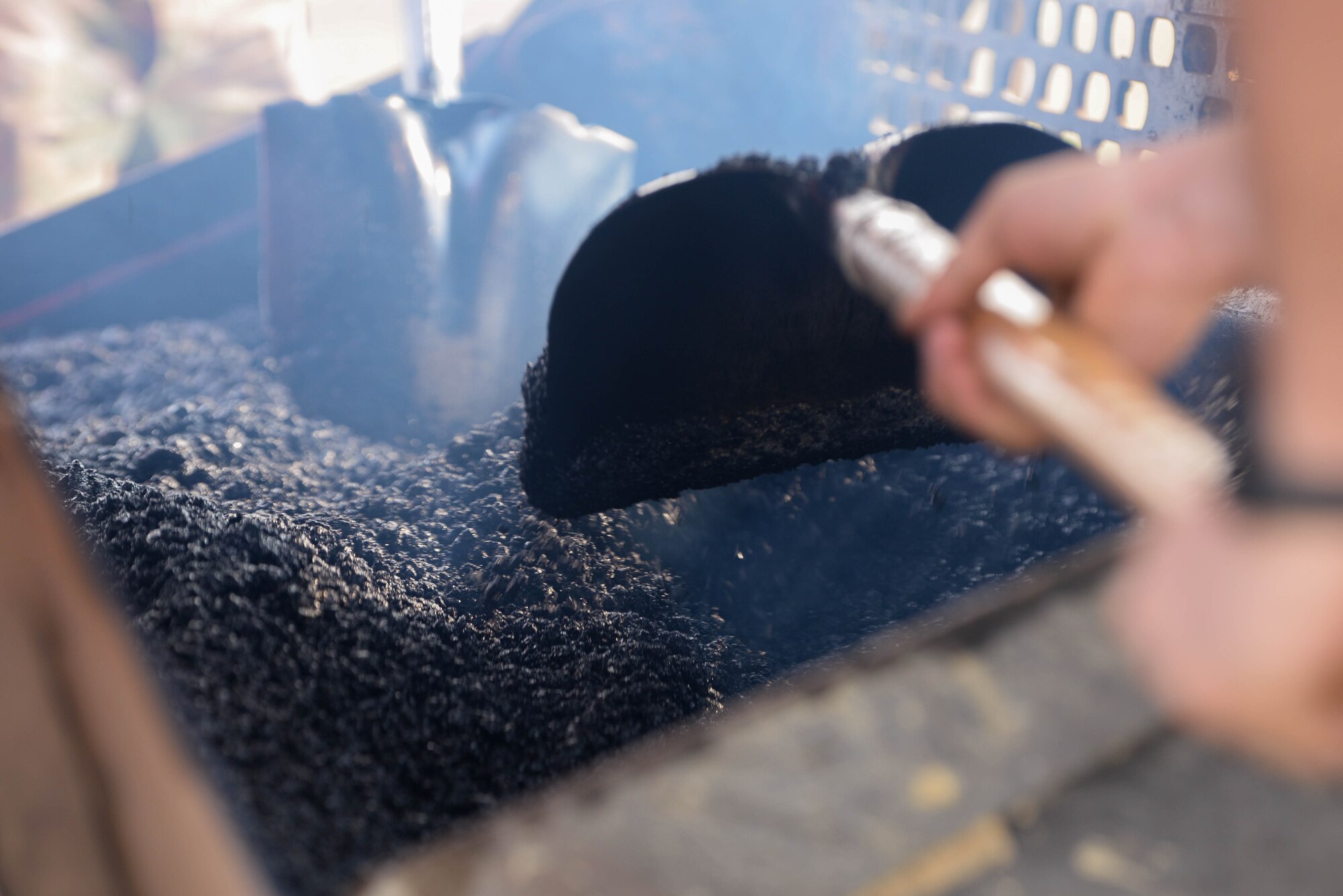 U.S. Air Force Airmen assigned to the 51st Civil Engineer Squadron mix asphalt during a joint and combined rapid airfield damage repair training at Osan Air Base, Republic of Korea, April. 3, 2025. During the day-long instructional and hands-on training, service members assigned to the U.S. Air Force, U.S. Army, and ROKAF learned processes, techniques, and strategies used to swiftly repair multiple large craters in an airfield. (U.S. Air Force photo by Staff Sgt. Kahdija Slaughter)