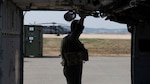 A pilot performs preflight checks