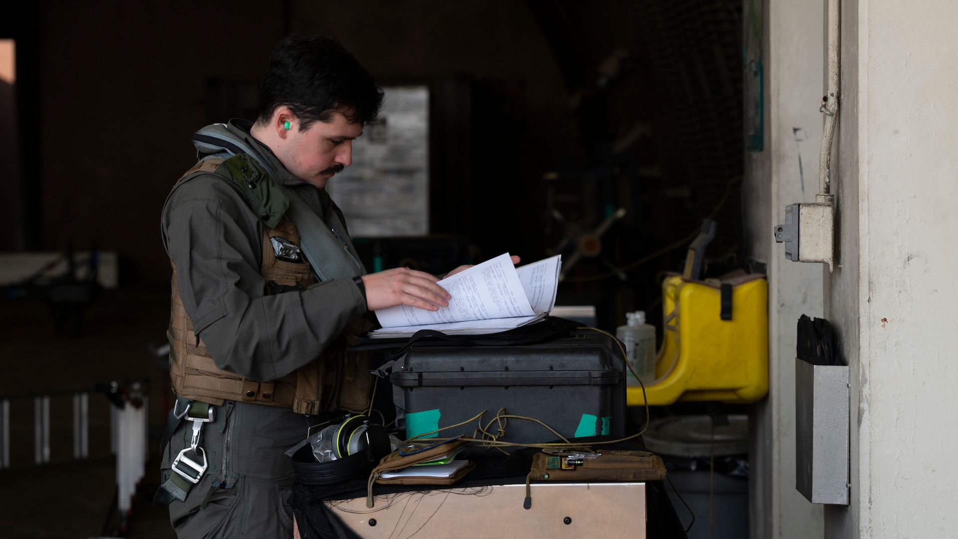 A pilot reviews pre-flight procedures