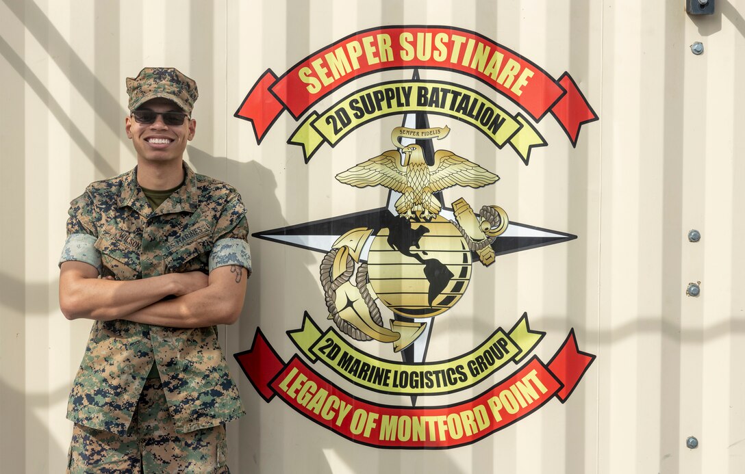 U.S. Marine Corps Cpl. Devin Wilson, an ammunition technician with 2nd Combat Readiness Regiment, 2nd Marine Logistics Group, and native of Seffner, Florida, poses for a photo at Marine Corps Base Camp Lejeune, North Carolina, April 3, 2025. According to his command, Wilson was selected as Warrior of the Week for his dedication to his unit’s mission and always setting the standard for his Marines as an Ordnance Information System manager while serving as part of Ammunition Company. While with the company, Wilson completed 253 ammunition transactions spanning 73 Department of Defense Information Codes with a grand total of 767,632 rounds of ammunition supporting 15 units within II Marine Expeditionary Force. Each week, 2nd MLG recognizes one outstanding Marine or Sailor that goes above and beyond in their duties and embodies the qualities of an outstanding service member. (U.S. Marine Corps photo by Lance Cpl. Isabella Ramos)