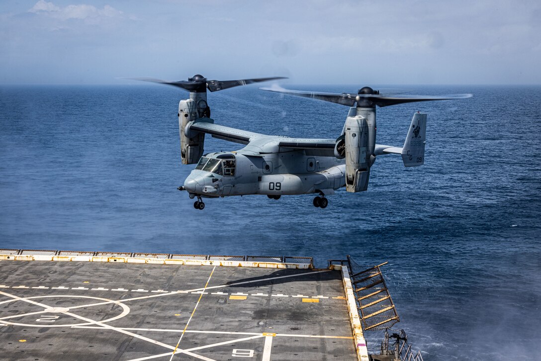 An MV-22 Osprey with Marine Medium Tiltrotor Squadron 263 (Reinforced), 22nd Marine Expeditionary Unit, lands on the San Antonio-class amphibious transport dock ship USS San Antonio (LPD 17), Iwo Jima Amphibious Readiness Group (ARG), during flight operations as part of Amphibious Squadron 8 (PHIBRON 8), 22nd MEU Integration (PMINT) exercise while underway in the Atlantic Ocean, April 4, 2025. PMINT is the 22nd MEU’s first opportunity in their pre-deployment training program to fully integrate with PHIBRON 8 while at sea, allowing Marines and Sailors to train together as an ARG/MEU team. (U.S. Marine Corps photo by Sgt. Nathan Mitchell)