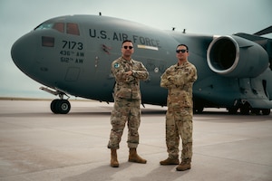 U.S. Space Force Maj. Esteban Bedoya, 31st Space Sustainment Squadron GPS III & Detachment 1 program manager, and U.S. Air Force Capt. Sebastian Bedoya, 3rd Airlift Squadron C-17 Globemaster III pilot, worked side-by-side to transport GPS III Space Vehicle 08 from Buckley Space Force Base, Colo., to Florida on April 2, 2025. The brothers had the unique opportunity to align their separate services' efforts to ensure the safe arrival of the GPS system to Cape Canaveral, where it will begin processing in preparation for launch in late spring. (U.S. Space Force Photo by Senior Airman Joshua Hollis)