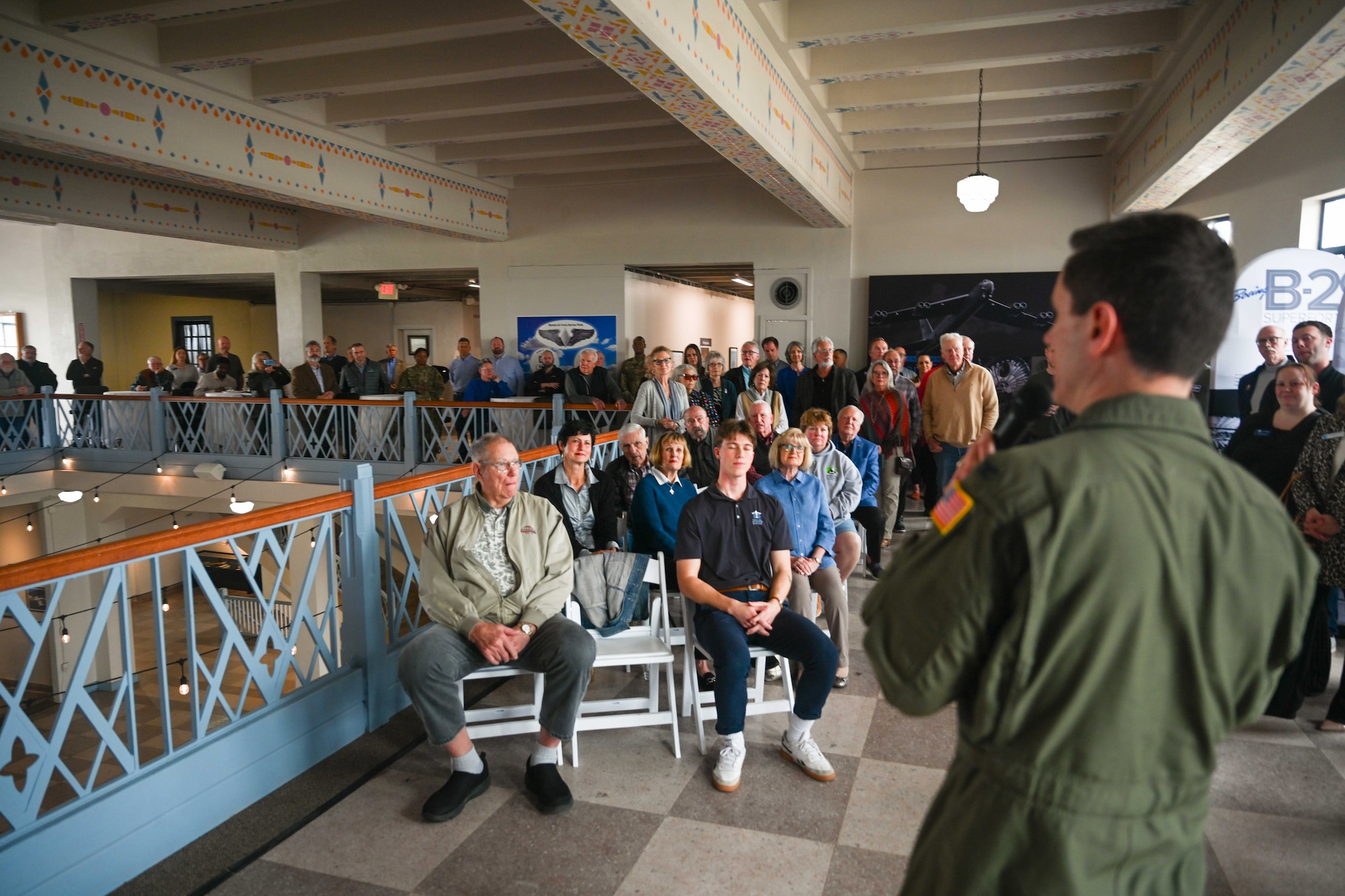 Col. Cory Damon, 22nd Air Refueling Wing commander, speaks before helping the release of the Robin Spurrier Exhibit April 1, 2025 in Wichita, Kansas. The Kansas Aviation Museum put on an event to cut the ribbon to a display honoring his legacy as he was a hero in the local community. (U.S. Air Force photo by Senior Airman William Lunn)