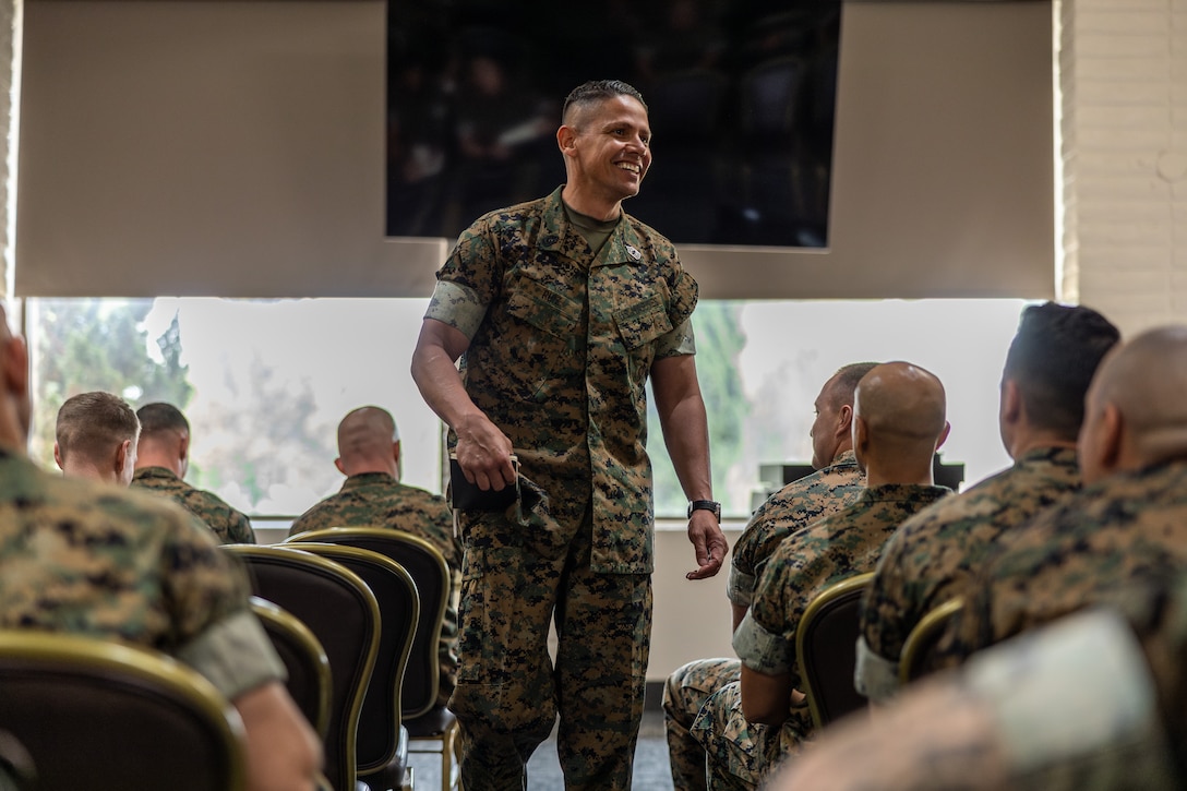 U.S. Marine Corps Sgt. Maj. Carlos A. Ruiz, the sergeant major of the Marine Corps, greets first  sergeants within Marine Corps Installations West during a mentorship town hall on Marine  Corps Base Camp Pendleton, California, June 6, 2024. (U.S. Marine Corps photo by Lance Cpl.  Mhecaela J. Watts)