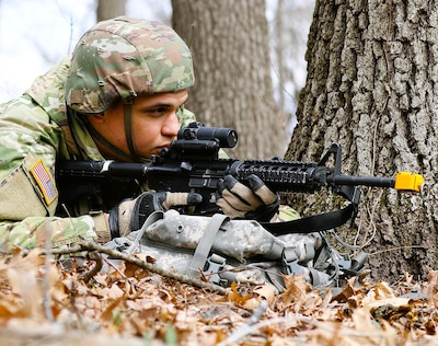 Illinois Army National Guard Spc. James Outlaw mans his position during base defense training at Marseilles Training Area on March 31.