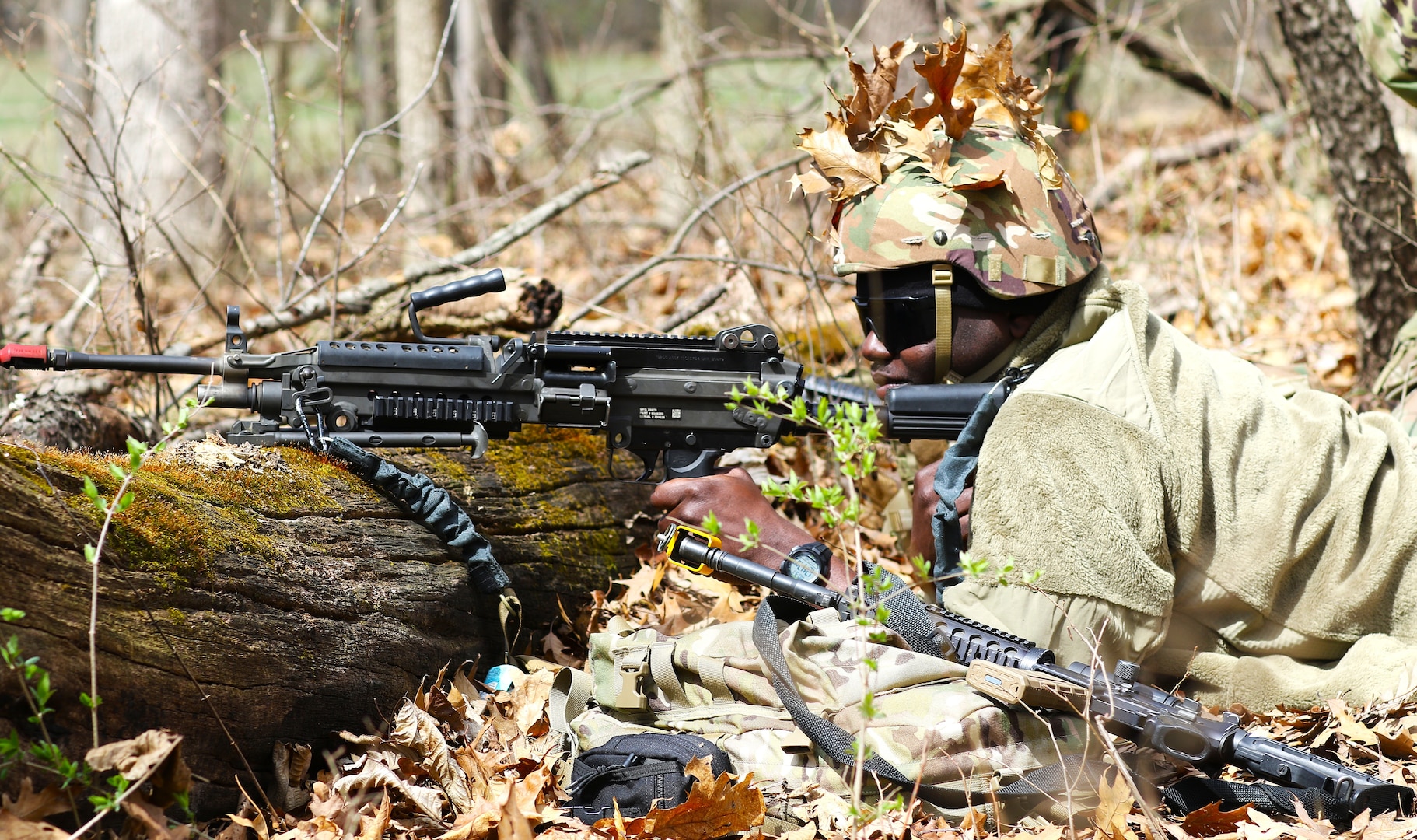 Illinois Army National Guard Spc. Termaine Cunningham mans his position during base defense training at Marseilles Training Area