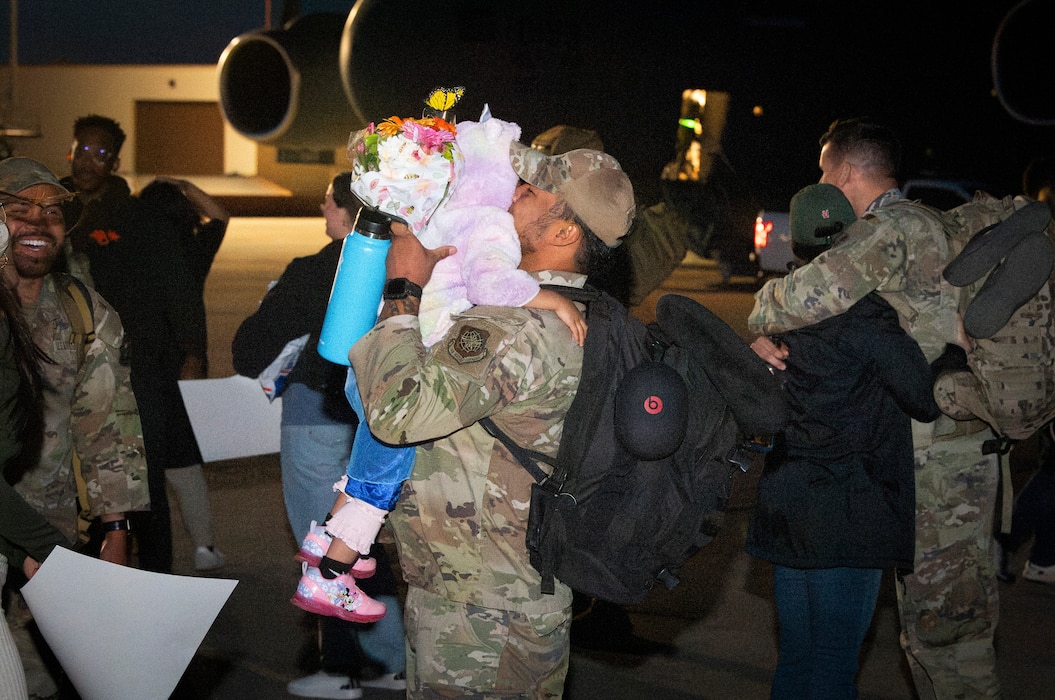 Man holds child