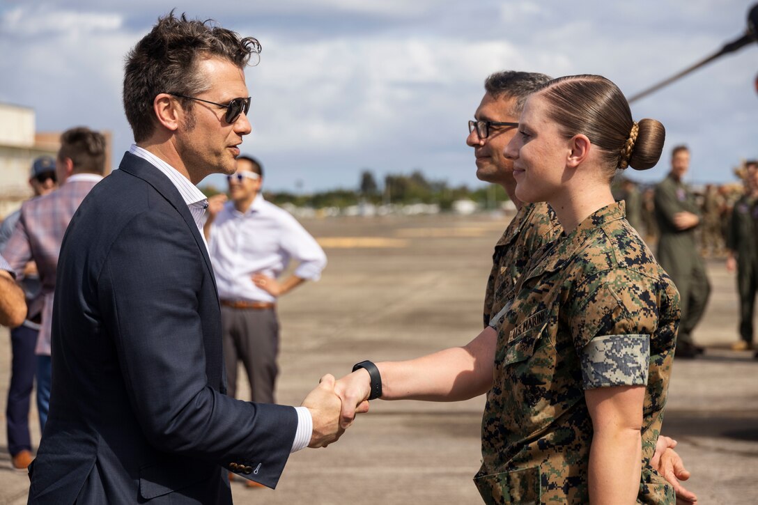 U.S. Secretary of Defense Pete Hegseth, left, greets U.S. Marines with U.S. Marine Corps Forces, Pacific (MARFORPAC) at Marine Corps Base Hawaii, March 25, 2025. Hegseth conducted a walk-through of troop static displays, engaging with and presenting coins to service members from MARFORPAC, and U.S. Army Pacific. (U.S. Marine Corps photo by Sgt. Julian Elliott-Drouin)