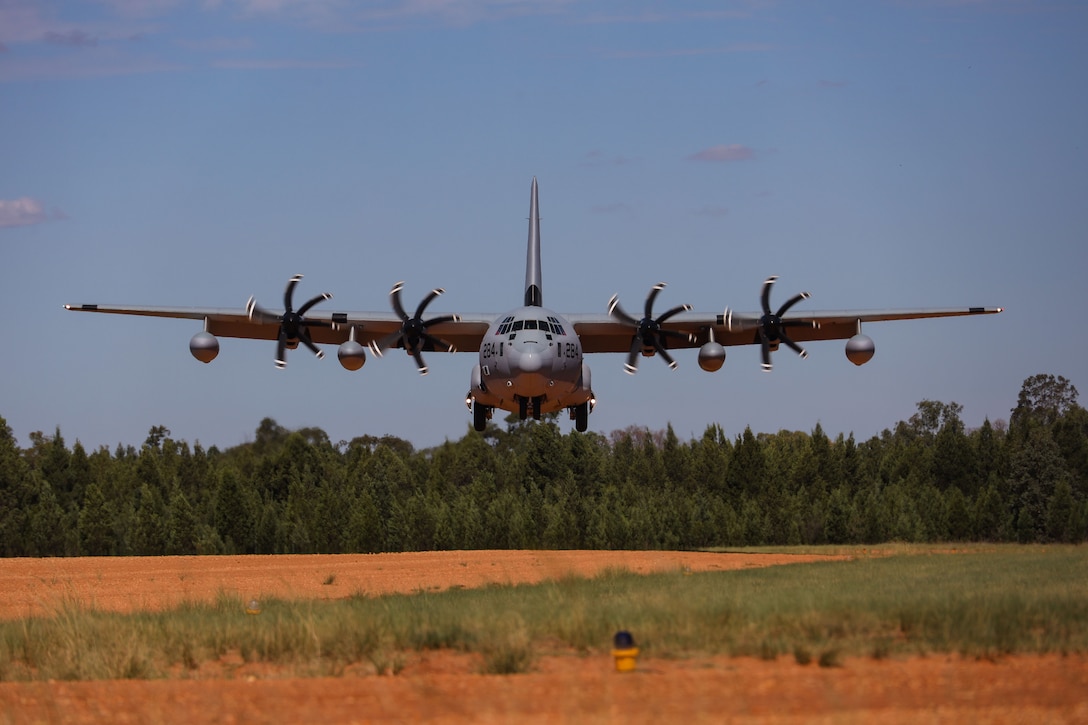 A U.S. Marine Corps KC-130J assigned to Marine Aerial Refueler Transport Squadron (VMGR) 153, Marine Aircraft Group 24, 1st Marine Aircraft Wing, lands on an assault landing zone during a deployment for training (DFT) at landing zone Gilgandra, New South Wales, Australia, April 4, 2025. The DFT provided VMGR-153 pilots and crew with unit level training that enhanced the squadron capabilities and readiness while engaging with partner forces for future interoperability. (U.S. Marine Corps photo by Cpl. Anabelle Reed-O’Brien)