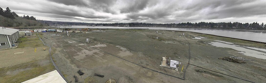 Aerial photo of Wyckoff/Eagle Harbor, a Superfund site, includes the former Wyckoff Company wood treatment facility and subtidal/intertidal sediments in Eagle Harbor. Once complete, the perimeter barrier wall replacement project will expand public access on Bainbridge Island and protect critical habitat.