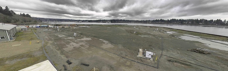Aerial photo of Wyckoff/Eagle Harbor, a Superfund site, includes the former Wyckoff Company wood treatment facility and subtidal/intertidal sediments in Eagle Harbor. Once complete, the perimeter barrier wall replacement project will expand public access on Bainbridge Island and protect critical habitat.
