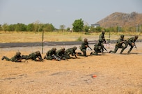 Members of the Royal Thai Army move across a simulated battlefield during Military Operations on Urbanized Terrain (MOUT) training with the U.S. Army on March 16, 2025, in Lop Buri, Thailand. MOUT is part of Hanuman Guardian 25, a bilateral training exercise to strengthen U.S. and Thai interoperability and readiness.