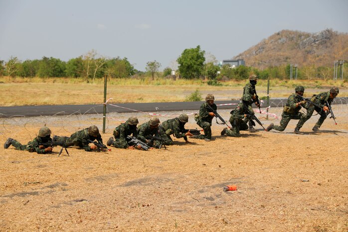 Members of the Royal Thai Army move across a simulated battlefield during Military Operations on Urbanized Terrain (MOUT) training with the U.S. Army on March 16, 2025, in Lop Buri, Thailand. MOUT is part of Hanuman Guardian 25, a bilateral training exercise to strengthen U.S. and Thai interoperability and readiness.
