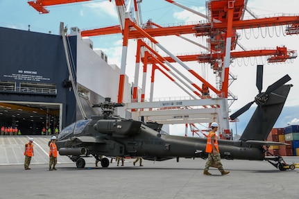 U.S. Army Soldiers of the 25th Combat Aviation Brigade, 25th Infantry Division, move an AH-46 Apache helicopter during port operations in support of Salaknib 25 at Subic Bay, Philippines, April 1, 2025.