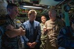 Adm. Bill Houston, director of the Naval Nuclear Propulsion Program, right, discusses the capabilities of Virginia-class fast-attack submarine USS Montana (SSN 794) with Vice Adm. Mark Hammond, chief of the Royal Australian Navy, left, and Greg Wilcock, Australian Consul-General Honolulu, center, during an underway embark aboard Montana, April 3, 2025.