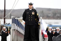 (April 5, 2025) – Sailors attached to the fast-attack submarine USS Iowa (SSN 797) man their newly commissioned submarine during a ceremony in Groton, Connecticut, April 5, 2025.