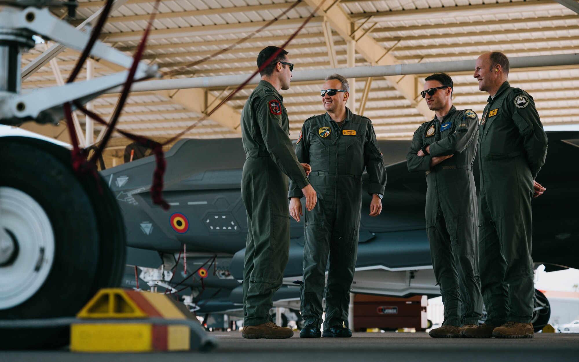 Belgian Air Component leadership converse on the flightline.