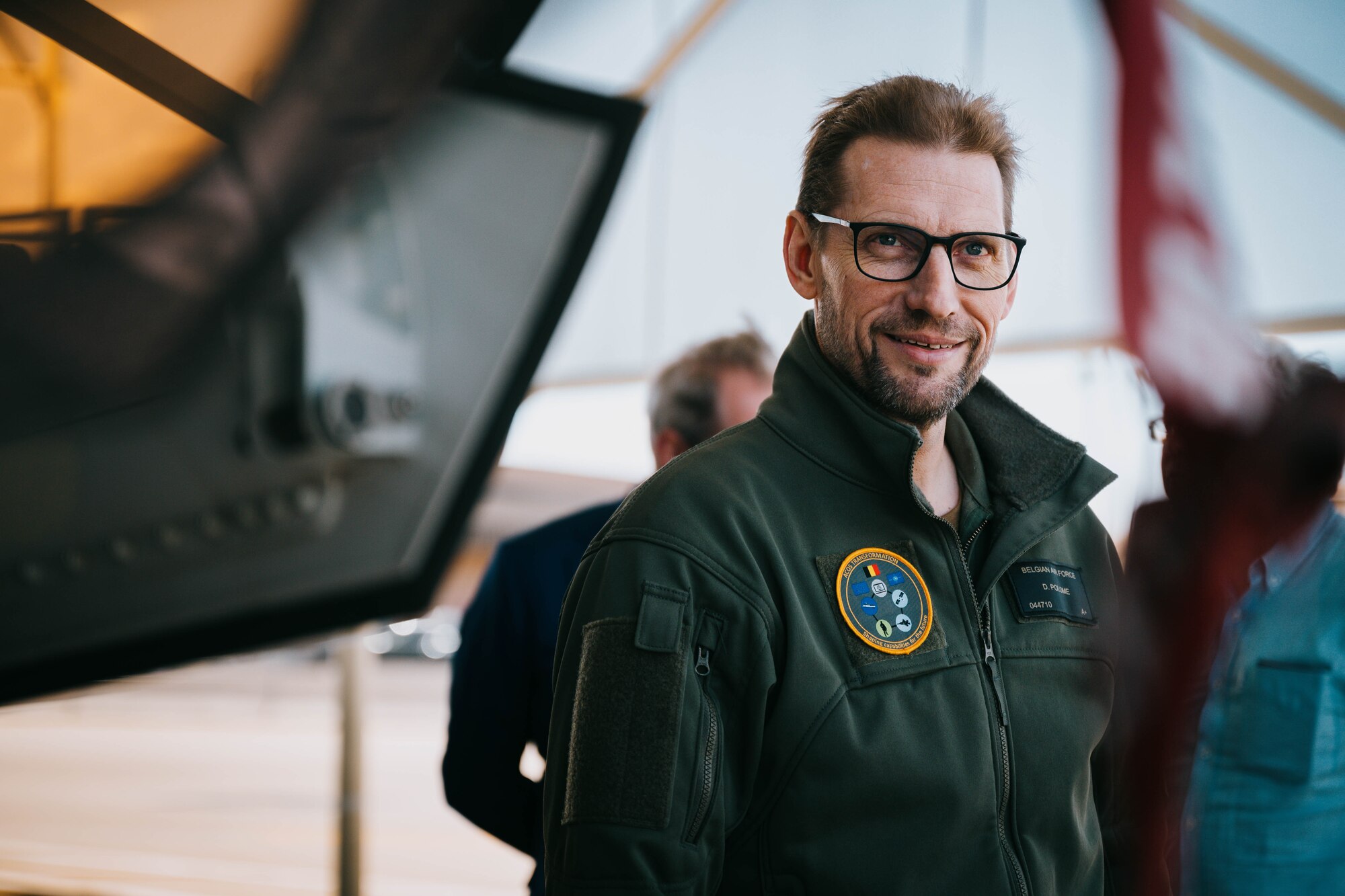 Belgian Air Component Brig. Gen. Didier Palome, BAC director of transportation, inspects a BAC F-35A Lightning II