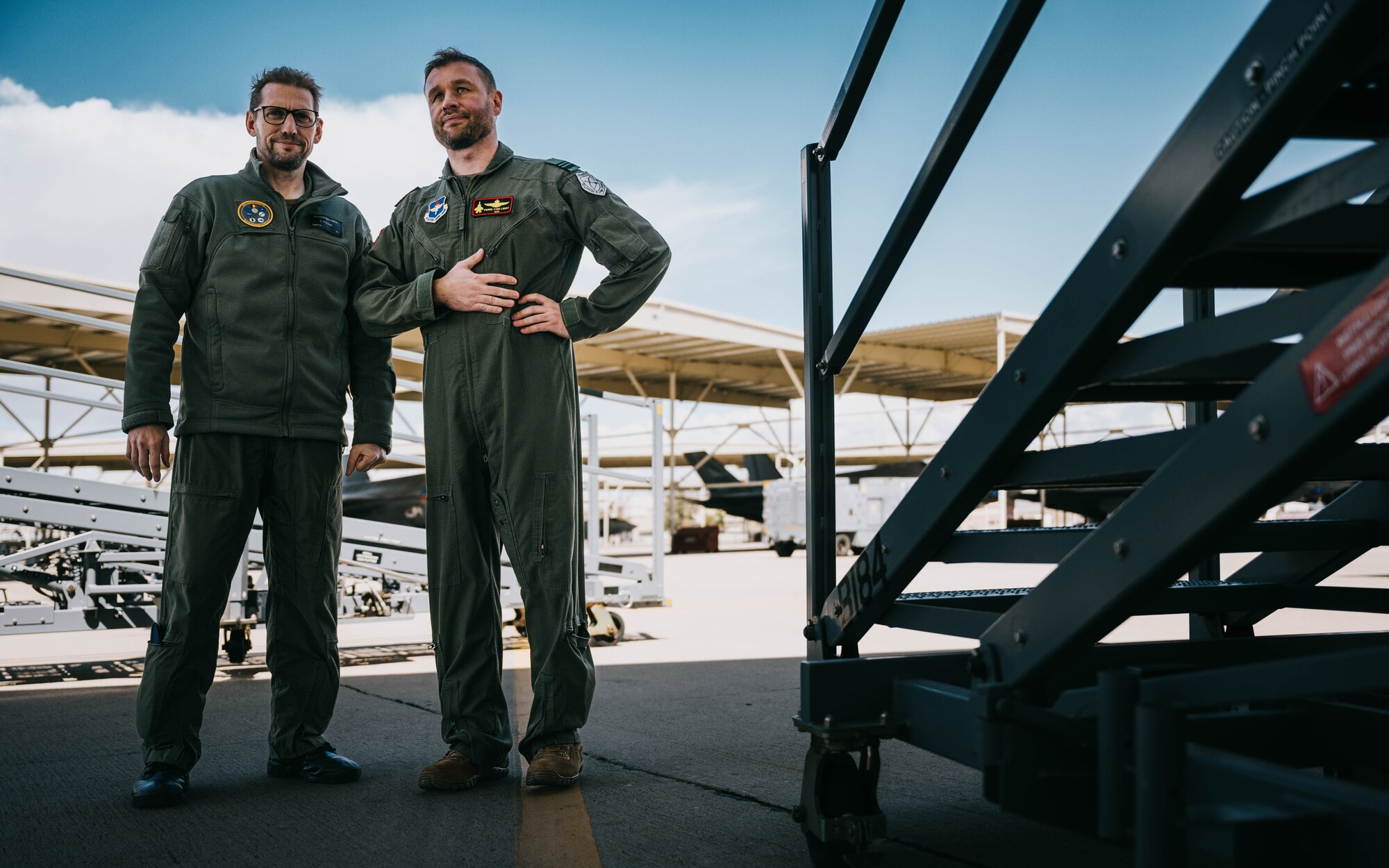 Belgian Air Component Brig. Gen. Didier Palome, BAC director of transportation and Lt. Col. Pierre-Yves Libert, 312th Fighter Squadron senior national representative, discuss F-35A Lightning II capabilities on the flightline