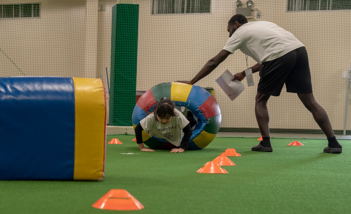 An Operation CODE (Children on Deployment Exercise) participant undergoes an obstacle course hosted by the 35th Force Support Squadron at Misawa Air Base, Japan, April 5, 2025. Operation CODE offered children a hands-on opportunity to engage with the procedures that ensure the 35th Fighter Wing remains mission-ready. (U.S. Air Force photo by Senior Airman Brittany Russell)