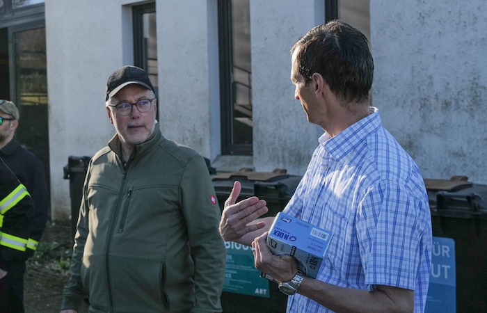 Christian Turner, 52nd Civil Engineer Squadron Environmental Chief, right, and Alois Gerten, the mayor of Spangdahlem welcome volunteers during the opening remarks of the annual Spanger Bach Cleanup in Spangdahlem, Germany, April 5, 2025. The community-led event brought together over 100 local residents, Airmen, and students to remove litter from the village and nearby stream.
