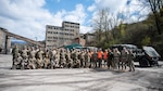 Airmen and Soldiers of the Maryland National Guard and members of the Armed Forces of Bosnia and Herzegovina pose for a group photo after scenario injects of changing a tire and engine repair during a convoy operation from Zenica to Visoko, in Kakanj, Bosnia and Herzegovina, April 7, 2025. The Maryland National Guard and the AFBiH held a joint logistics, vehicle maintenance, and public affairs exchange — Maryland’s largest State Partnership Program event in BiH — to help prepare AFBiH for Immediate Response–DEFENDER 25.