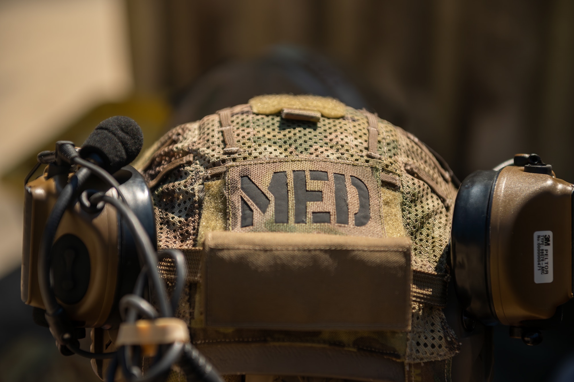 Picture of a back of a helmet with the "MED" letters on it.
