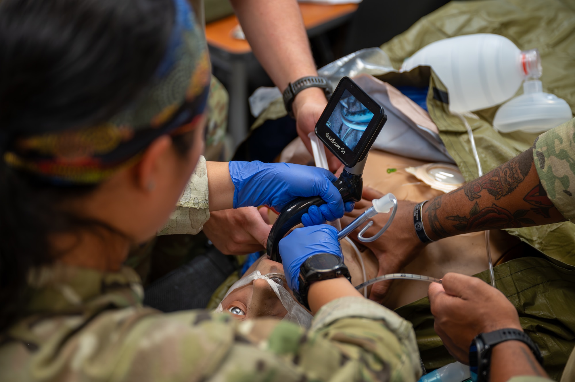 Medical Airmen perform an intubation using a GlideScope.