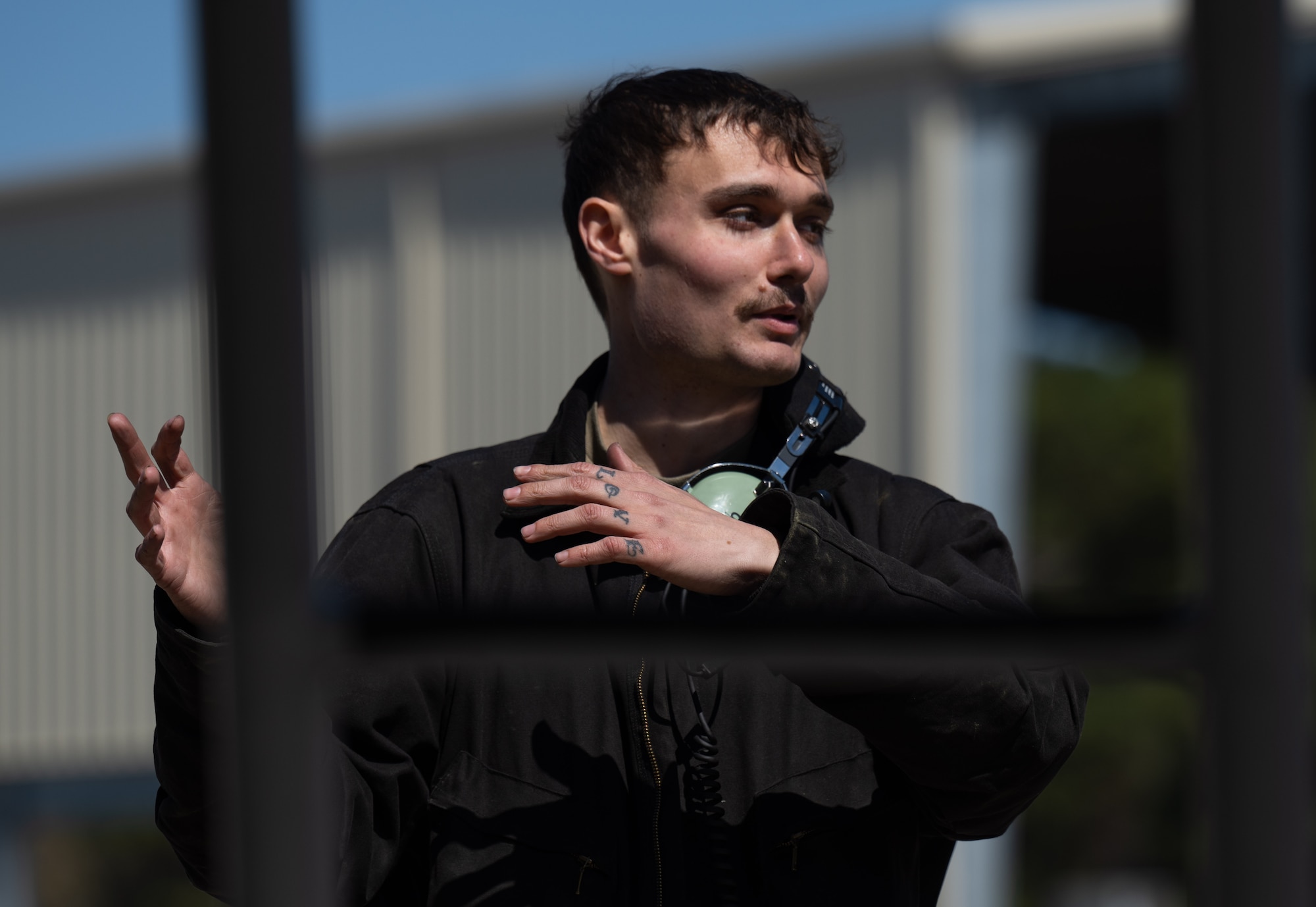 U.S. Air Force Airman 1st Class Trey Davies, 336th Fighter Generation Squadron crew chief, explains the importance of pre-flight checks at Seymour Johnson Air Force Base, North Carolina, March 26, 2025. Conducting pre-flight checks is vital to the safety of the aircrew. (U.S. Air Force photo by Airman 1st Class Rebecca Tierney)