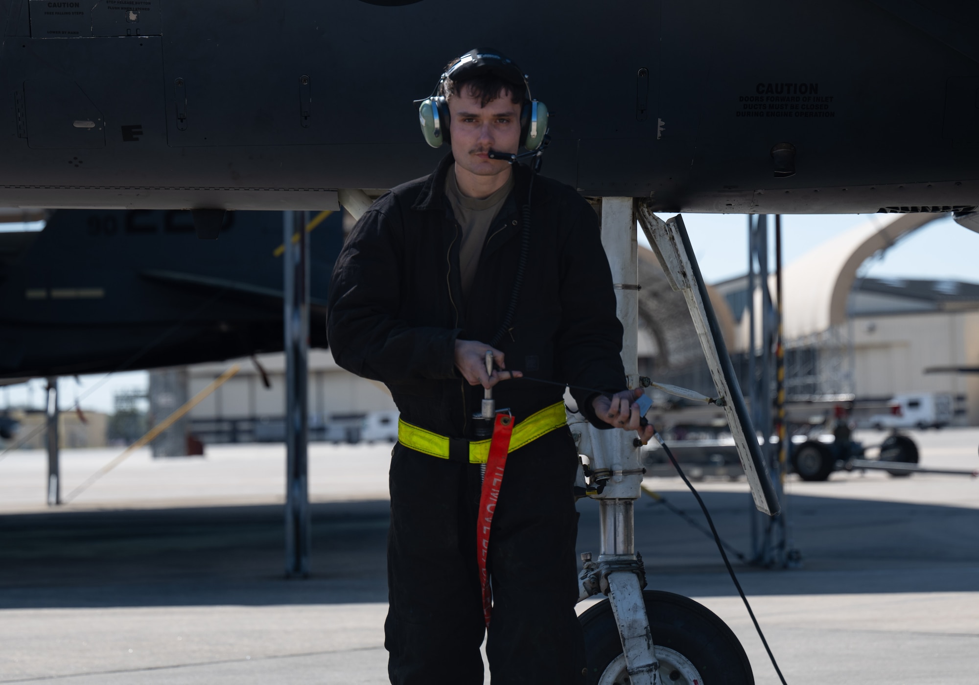 U.S. Air Force Airman 1st Class Trey Davies, 336th Fighter Generation Squadron crew chief, conducts a pre-flight inspection at Seymour Johnson Air Force Base, North Carolina, March 26, 2025. Conducting pre-flight checks is vital to the safety of the aircrew. (U.S. Air Force photo by Airman 1st Class Rebecca Tierney)