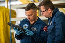 Propulsion technicians review procedures