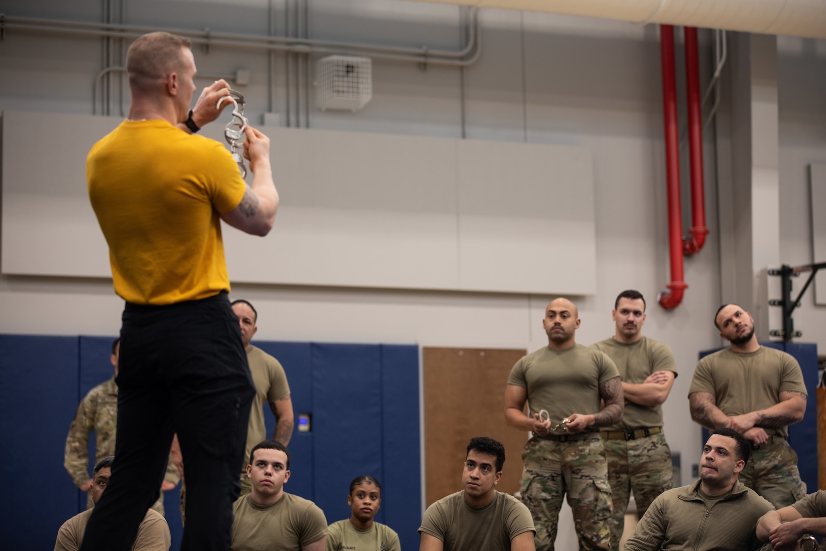 A Department of Corrections and Community Supervision instructor speaks to New York National Guardsmen at their DOCCS training facility in Albany on March 10, 2025.
