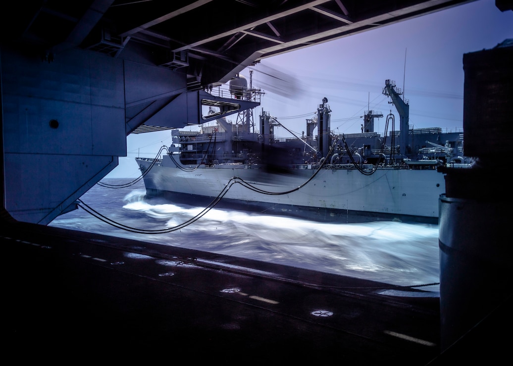 The world's largest aircraft carrier, USS Gerald R. Ford (CVN 78), conducts a replenishment-at-sea (RAS) with the fast combat support ship USNS Supply (T-AOE-6) in the Atlantic Ocean, April 4, 2025.