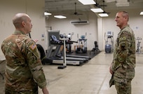 Senior Enlisted Advisor John Raines, SEA to the chief of the National Guard Bureau right, talks to Staff Sgt. Cameron Petty, left, a U.S. Army Reservist assigned to the installation in Garapan, Saipan, April 3, 2025