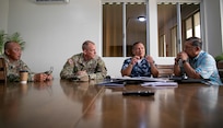 From left, Command Sgt. Maj. Celso Leonen, Guam National Guard’s command senior enlisted leader; Senior Enlisted Advisor John Raines, SEA to the chief, National Guard Bureau; Edward Camacho, special assistant to the Commonwealth of the Northern Mariana Islands governor for military affairs; and Harry Blanco, the CNMI, field representative under the Office of Insular Affairs, conduct a leader engagement at Saipan’s Department of Military Affairs, April 3, 2025.