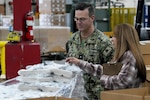 People in warehouse.