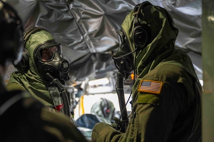 U.S. Air National Guard Airmen assigned to the 134th Air Refueling Wing discuss logistical movements inside a KC-135R Stratotanker during a training exercise, April 6, 2025 at McGhee Tyson Air National Guard Base, Tennessee.