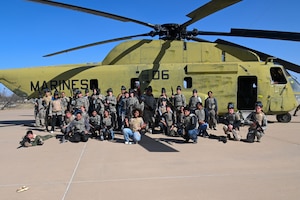 Central High School Air Force Junior ROTC pose in front of a decommissioned U.S. Marine Corps Sikorsky CH-53A Sea Stallion following a field training exercise at Goodfellow Air Force Base, Texas, March 7, 2025. Cadets strengthened their camaraderie by facing challenging situations and making decisions under pressure.  (U.S. Air Force photo by Airman 1st Class James Salellas)