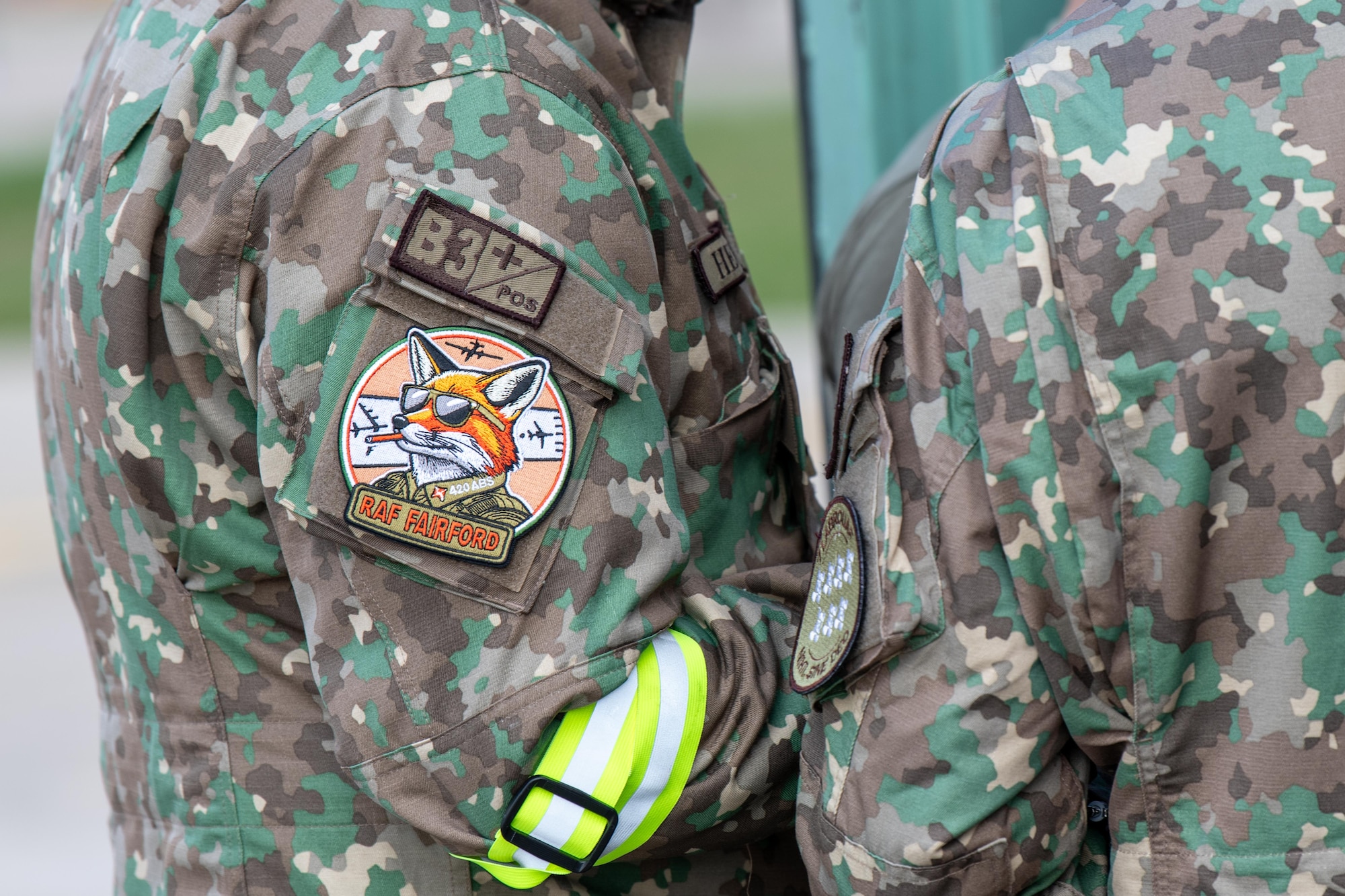 A RAF Fairford morale patch is worn by a Romanian Air Force (RoAF) crew chief